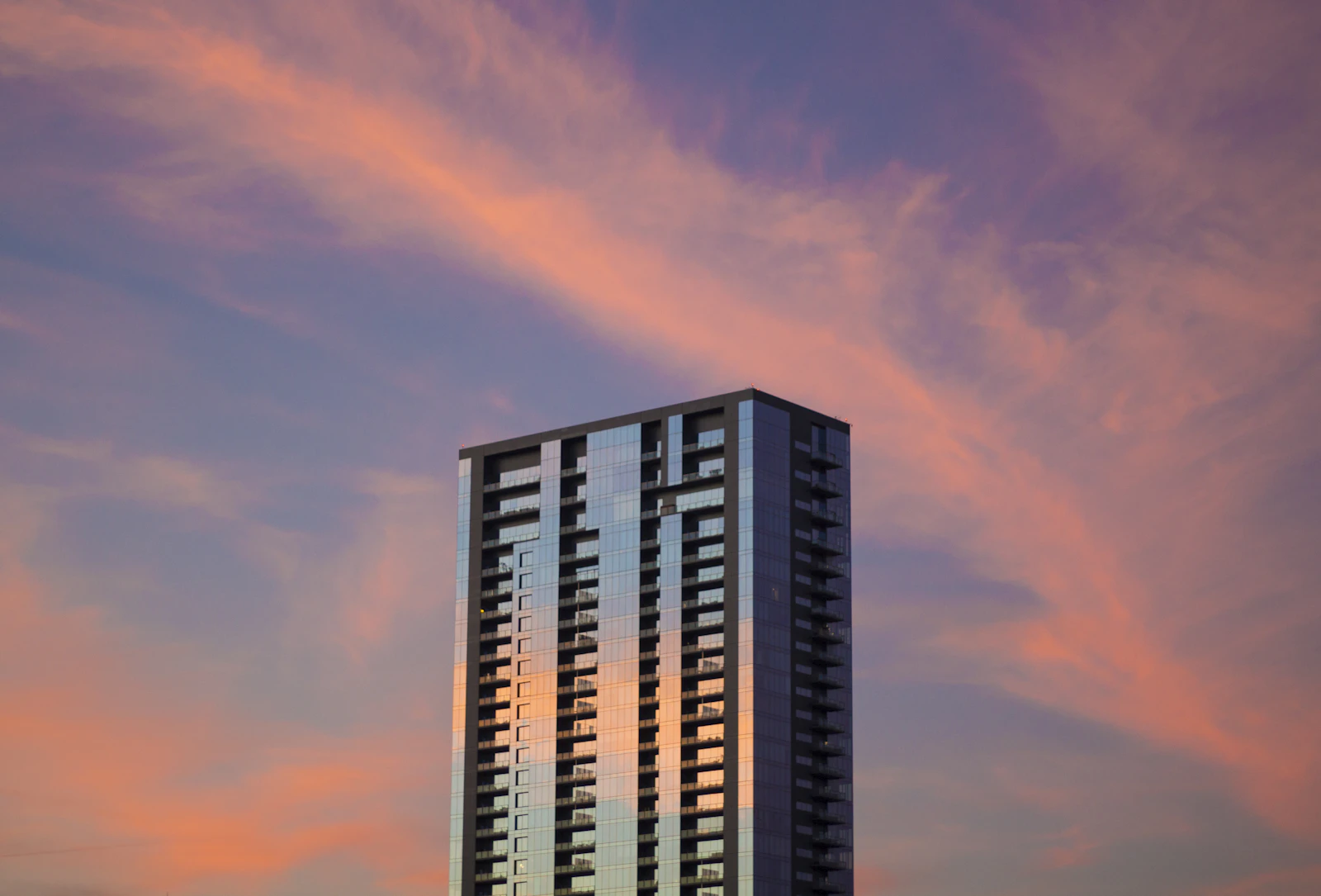 Halden tower against a pink evening sky