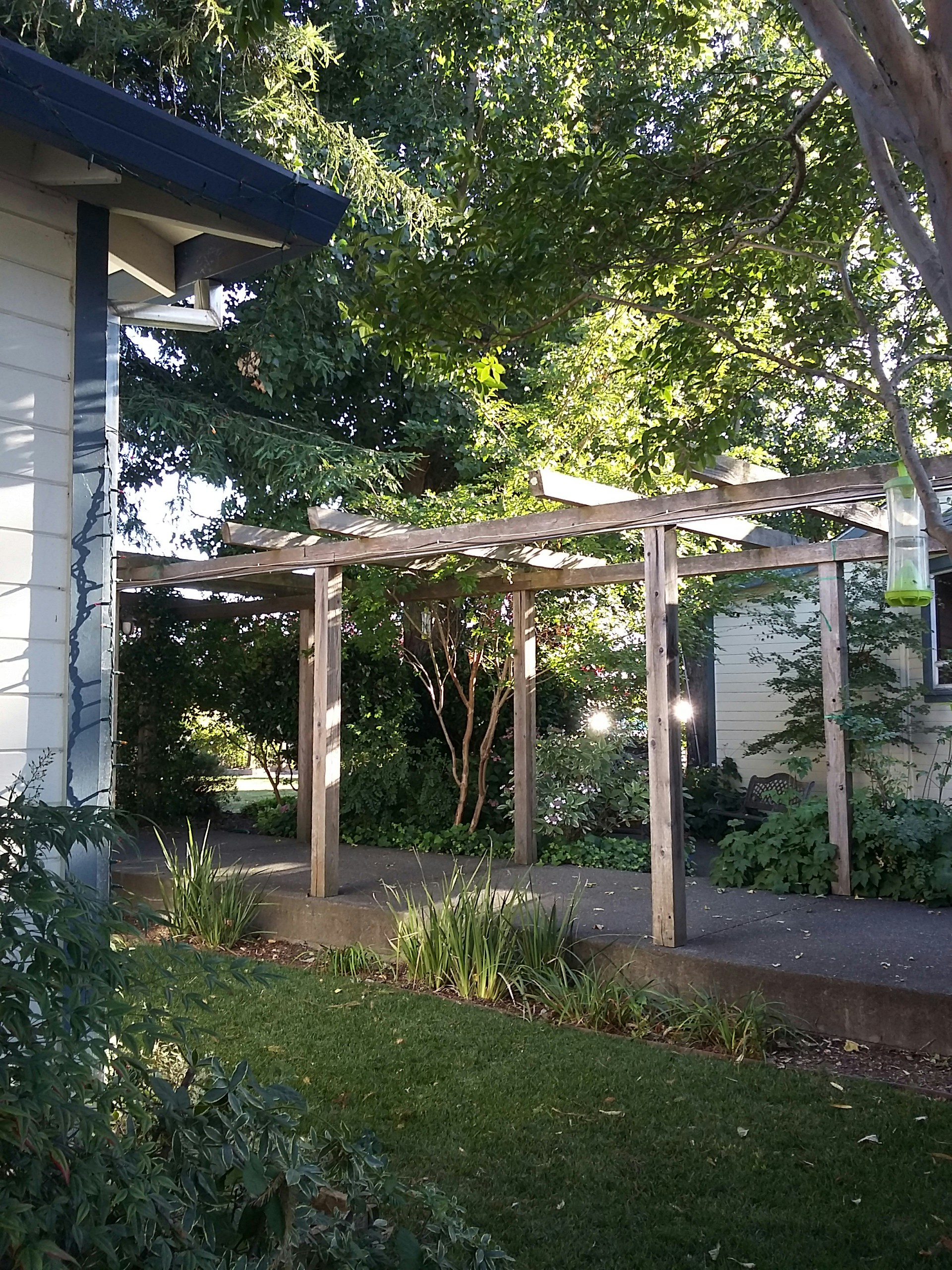 woman wearing yellow long-sleeved dress under white clouds and blue sky during daytime