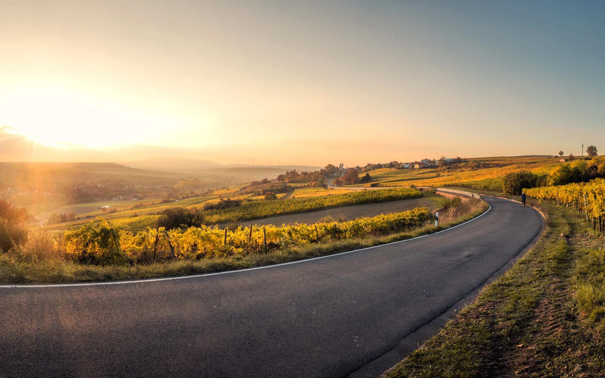 An open road running through open landscape