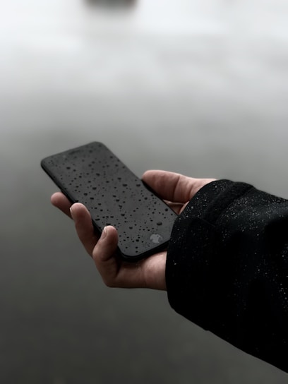 person holding iPhone