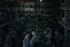 Spare parts inventory shelves filled with pollution control equipment.