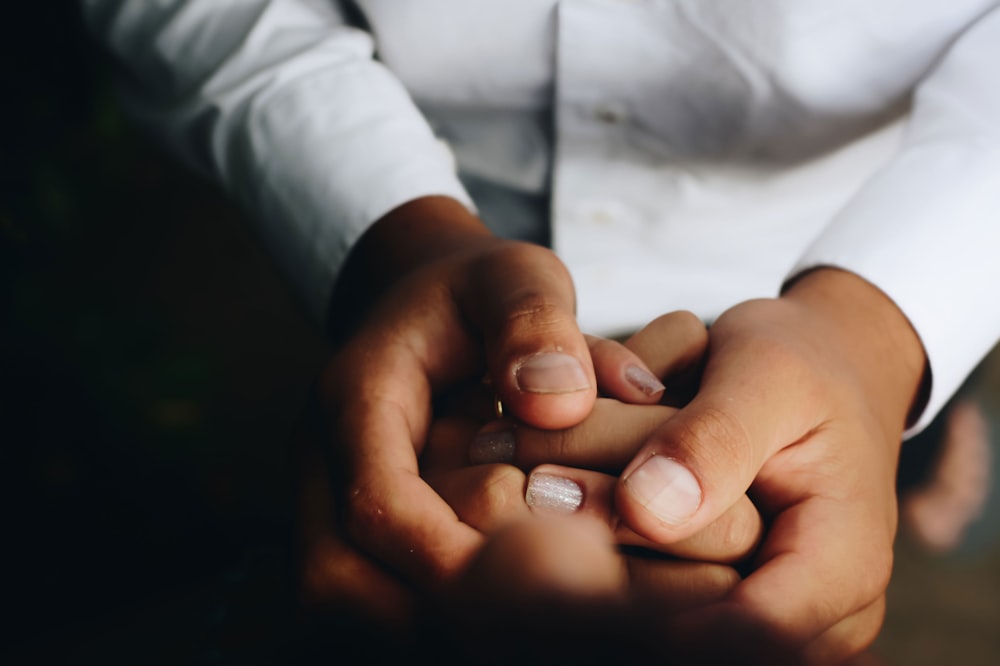 person holding hands