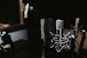 macro photography of silver and black studio microphone condenser