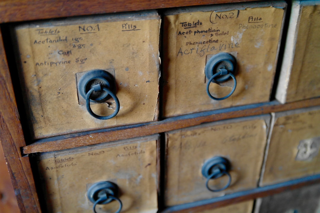 close shot of brown wooden drawer, Vintage medicine cabinet