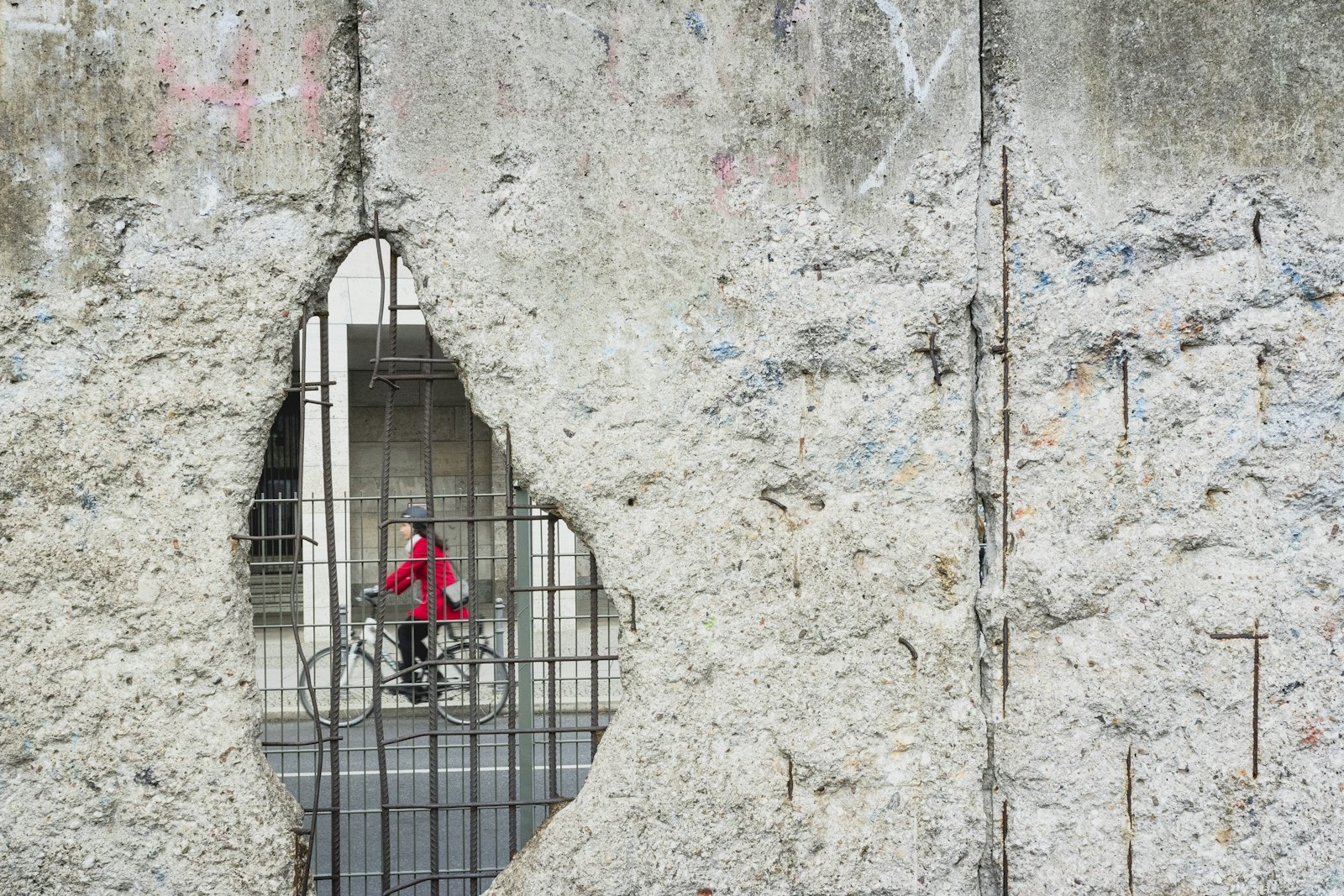 Canon EF 24mm F2.8 IS USM sample photo. Woman riding bicycle photography