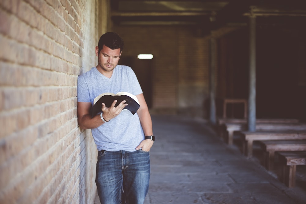 man reading book