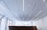 A beautifully lit living room featuring modern LED spotlights highlighting artwork.