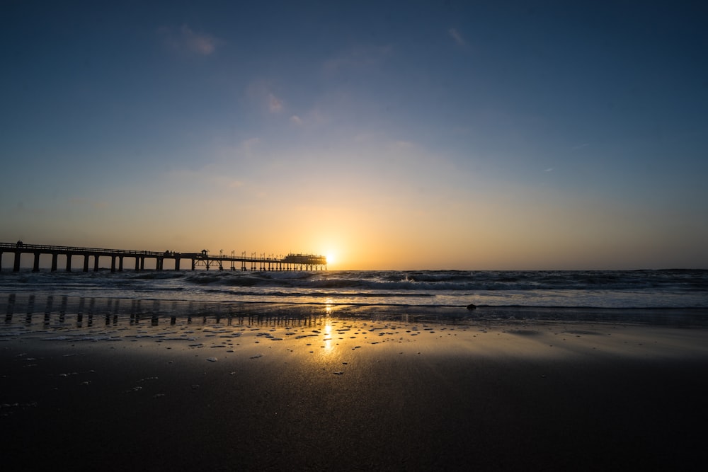 dock on shore at sunrise