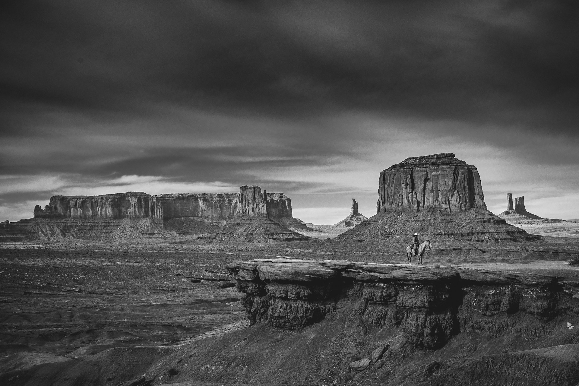 grayscale photo of rock formation