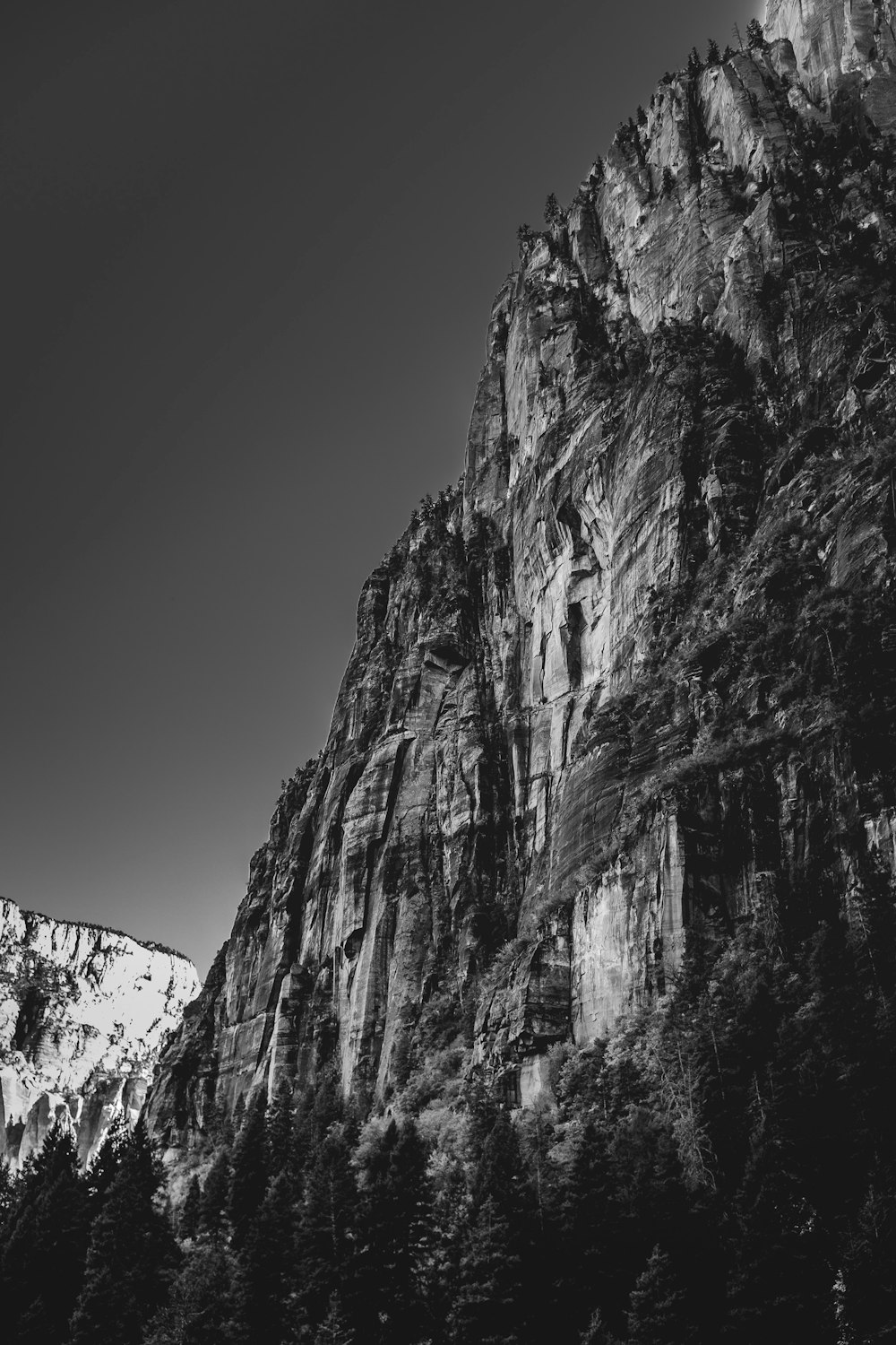 grayscale photo of rocky mountain