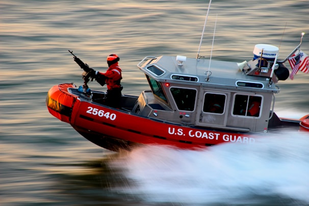 The U-1A Legion swiftly launching from an automated minecountermeasure vessel during a twilight drill.