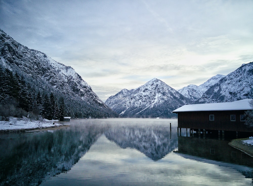 residence house in water surrounding mountain