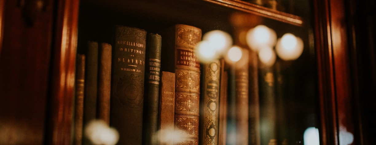 books in glass bookcase