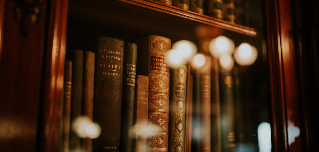 books in glass bookcase