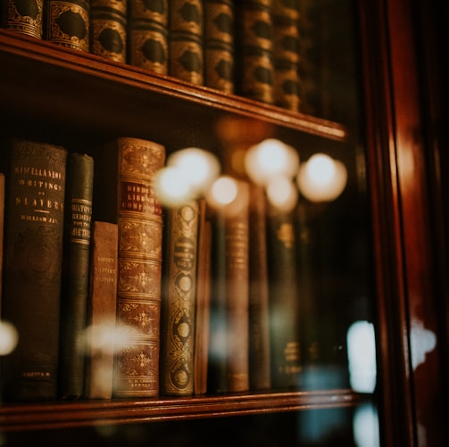 books in glass bookcase