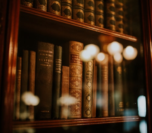 books in glass bookcase