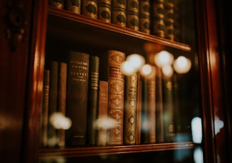 books in glass bookcase