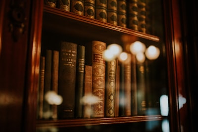 books in glass bookcase history zoom background