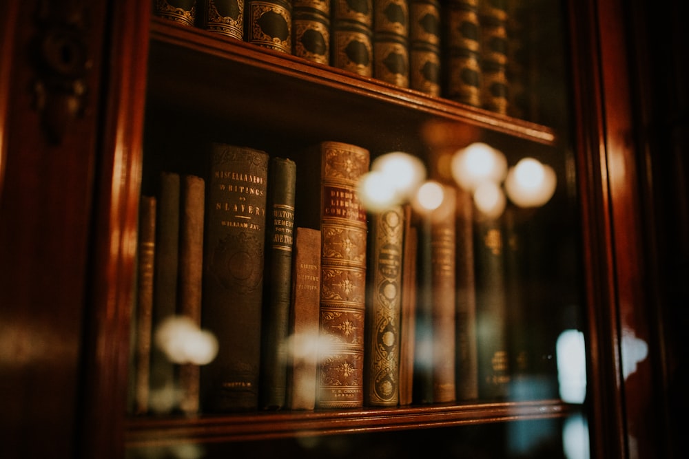 books in glass bookcase