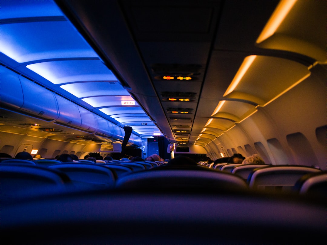 people sitting inside plane,