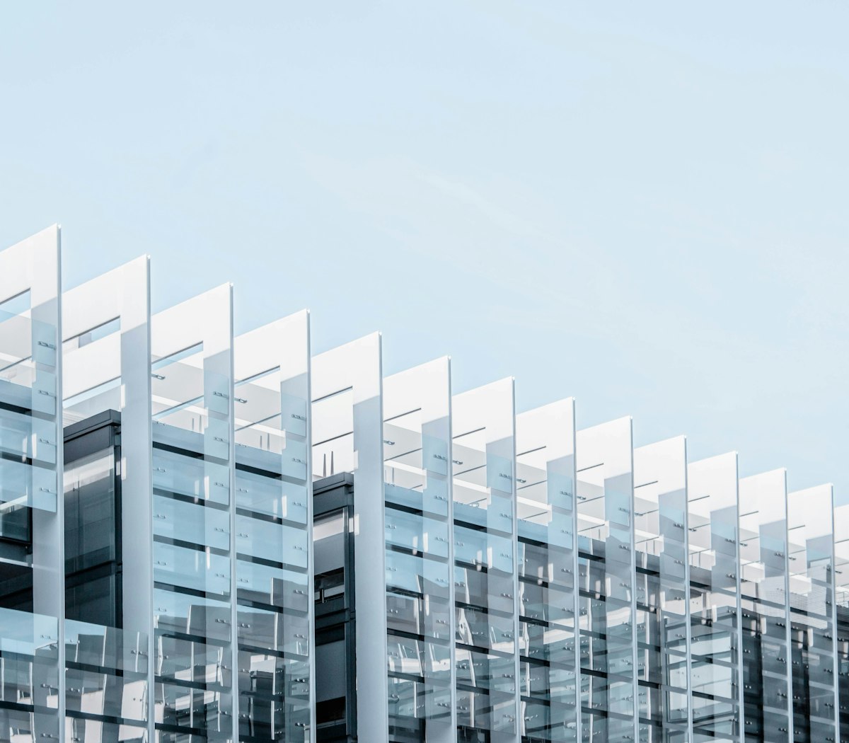 Gray glass building exterior representing the Doral dental office