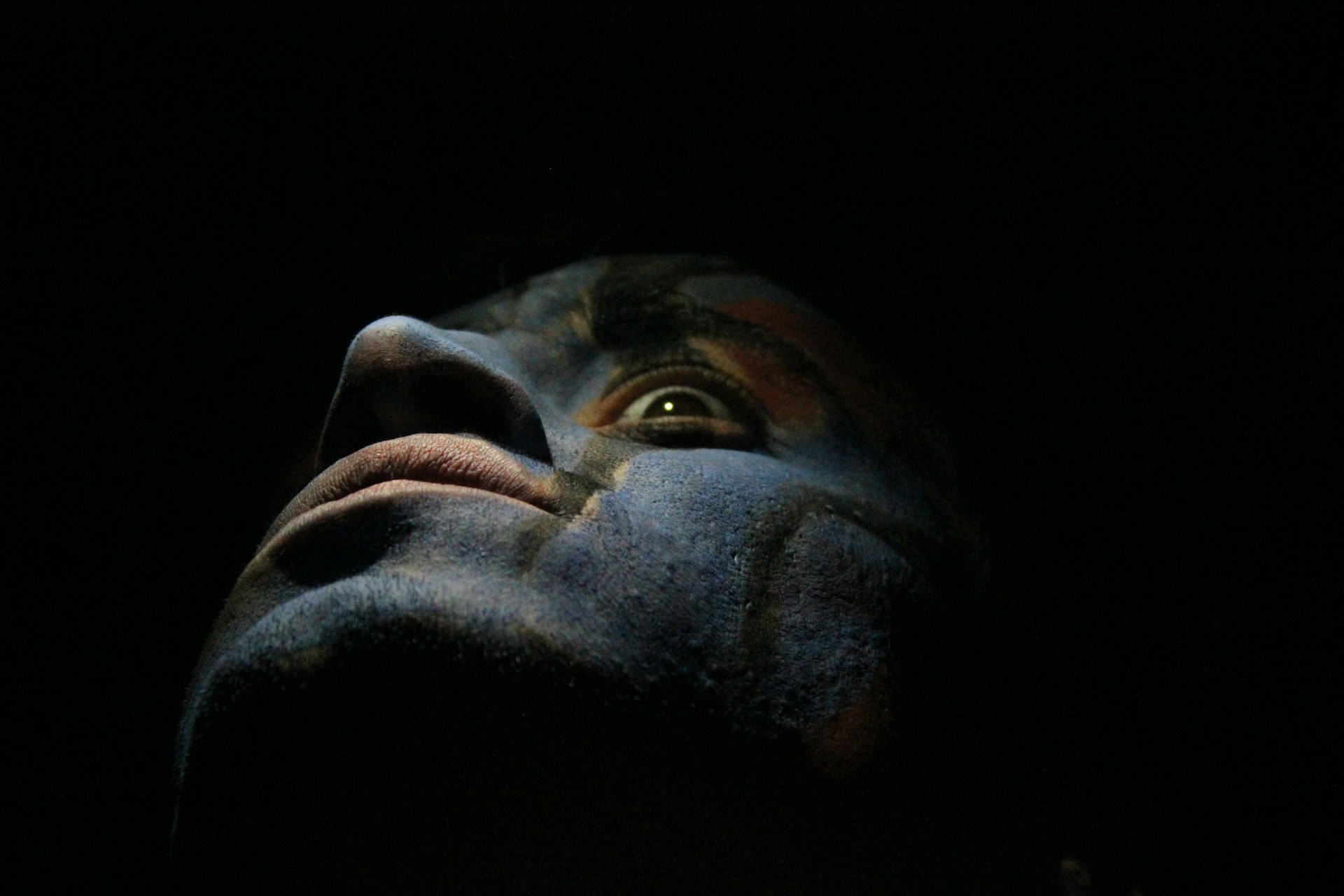 Before and after photo editing comparison showing a portrait transformed with enhanced colors and retouched details.