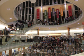 A successful influencer event with engaged attendees and brand displays.
