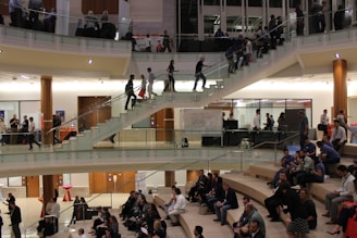 A spacious community center with people socializing.
