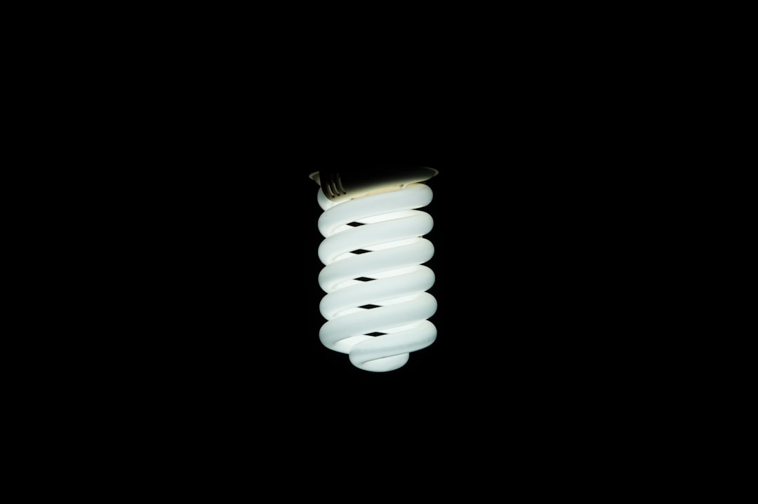 Spiral light bulb in a dark room