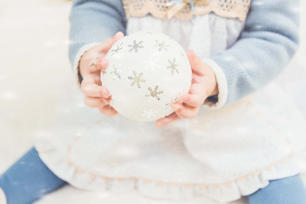 person holding ball