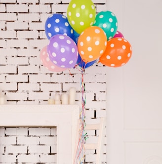 assorted-color polka dot balloons