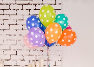 assorted-color polka dot balloons