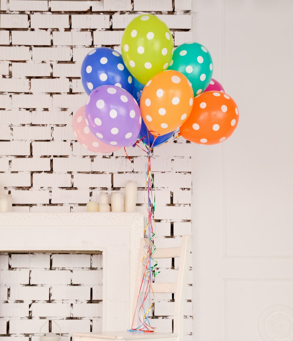 assorted-color polka dot balloons