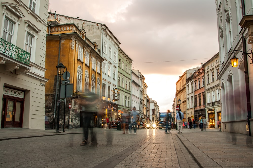 people near buildings and road