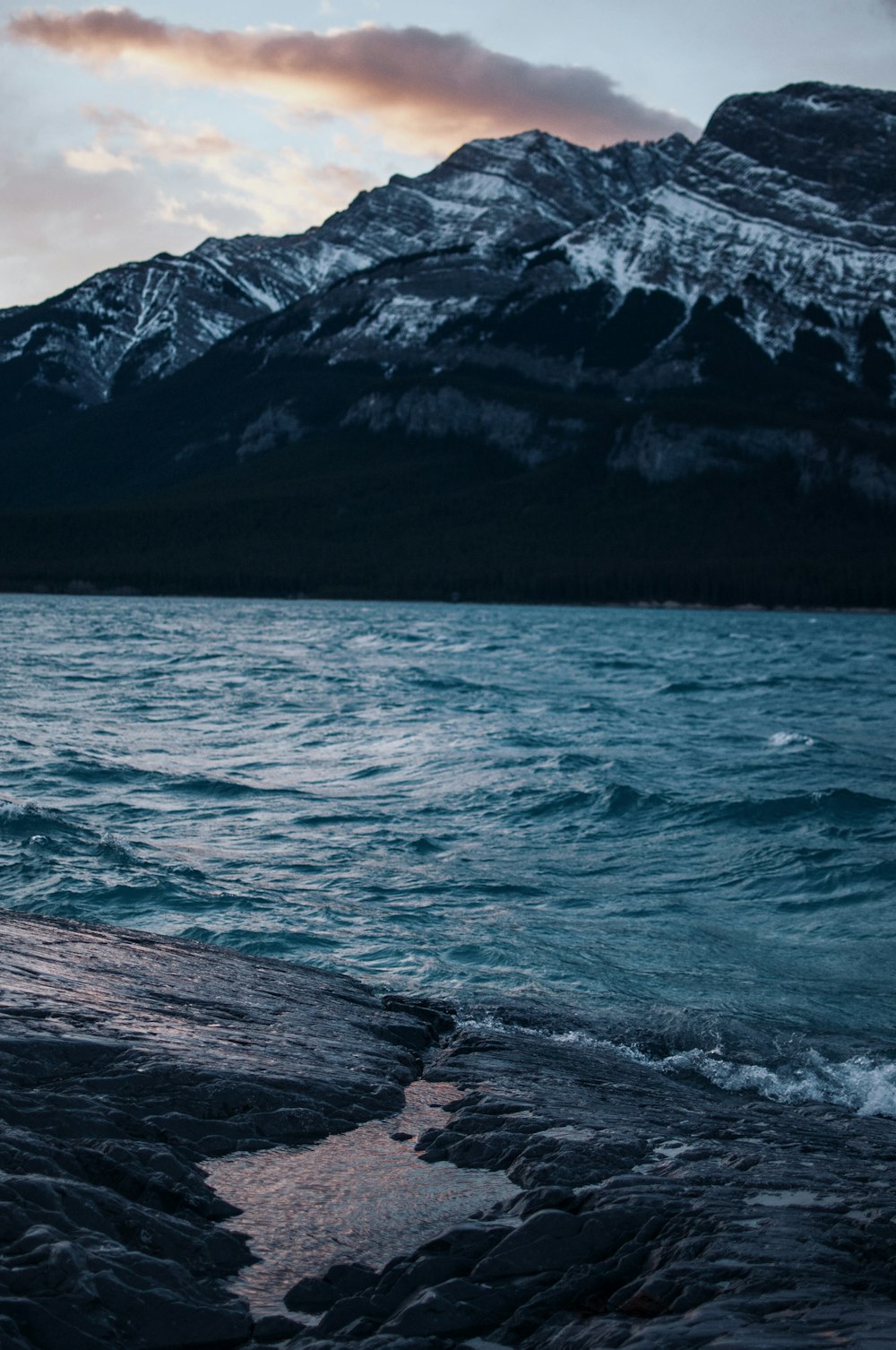 body of water near mountain