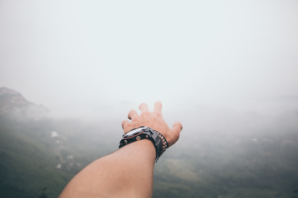 person wearing black watch