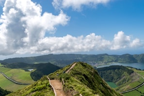 A scenic shot of a hiking trail surrounded by lush greenery, capturing Aparna’s love for nature and adventure.