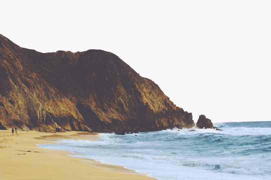 ocean near mountain in Gray Whale Cove State Beach United States