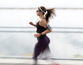 woman running wearing armband