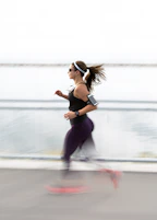woman running wearing armband