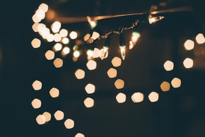 selective focus of string lights yule google meet background