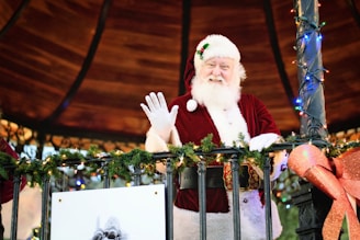 Santa Claus waving goodbye after a joyful visit.