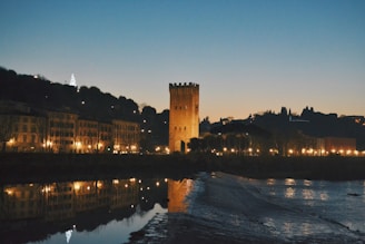 Tranquil evening view of Deva Towers illuminated softly against a twilight sky.
