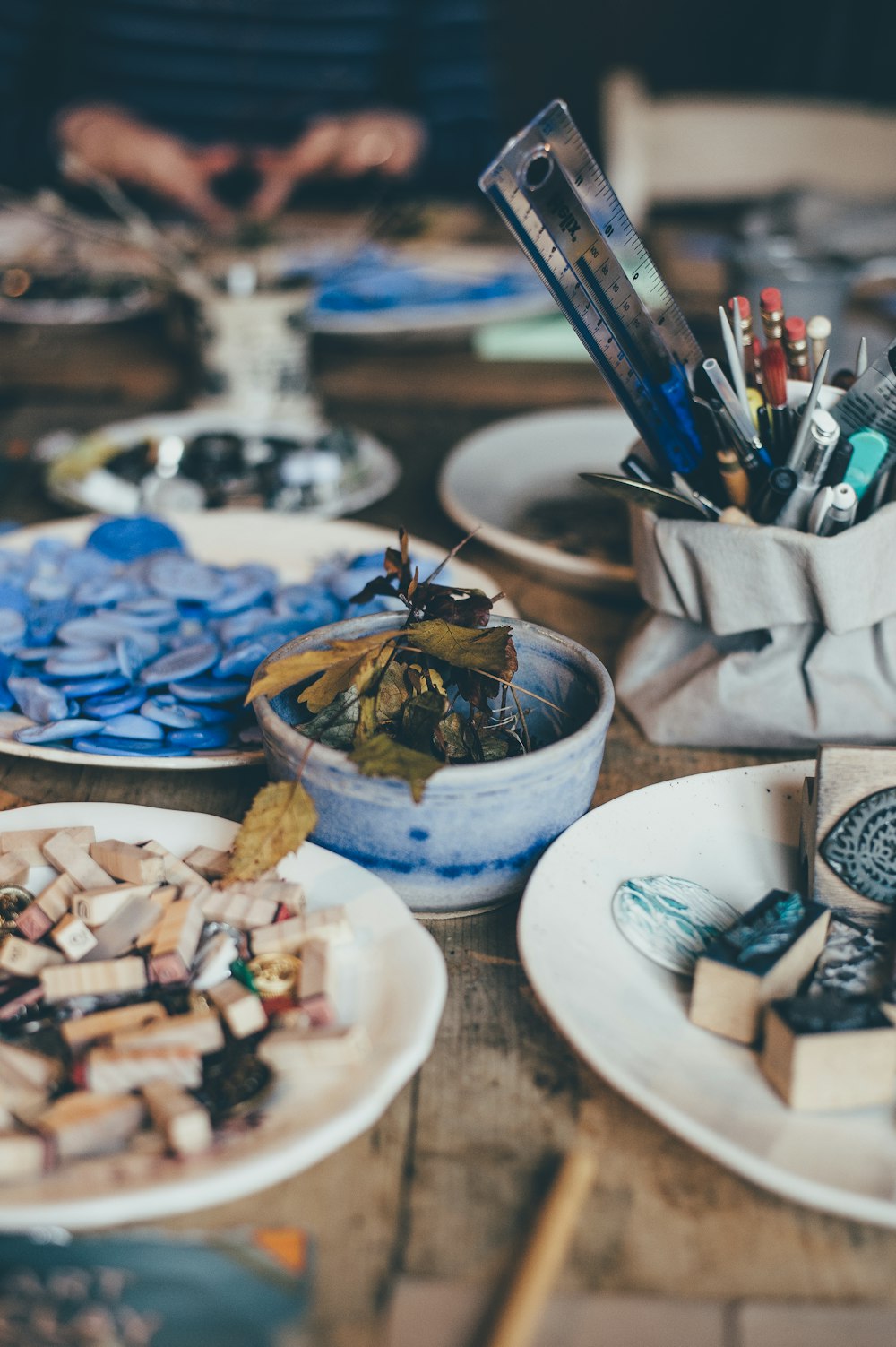 blue ceramic bowl on brown wooden table