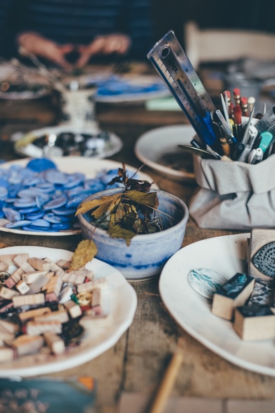 blue ceramic bowl on brown wooden table