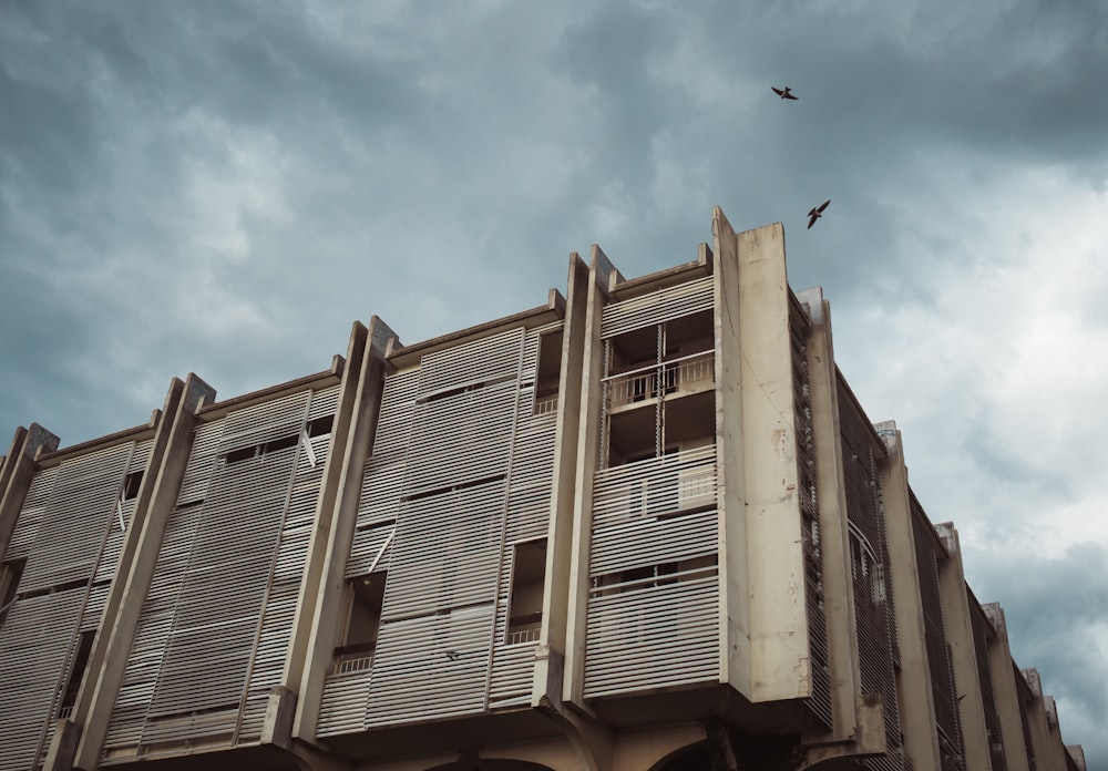 low angle photography of white concrete building