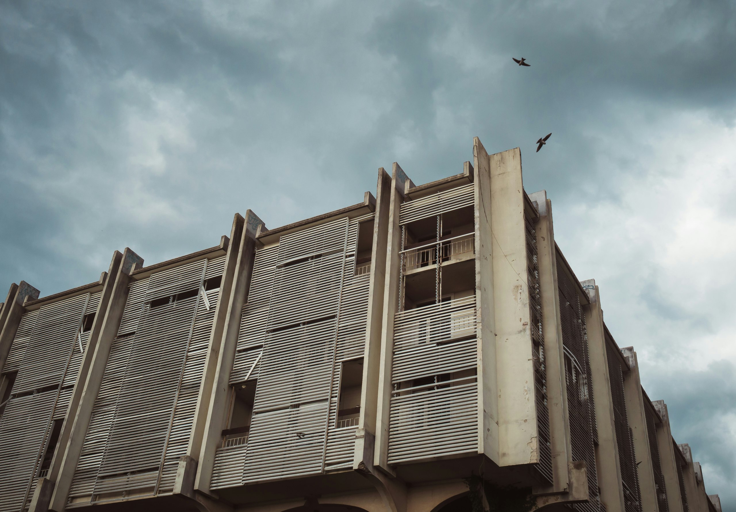 low angle photography of white concrete building