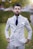 man in white and black pinstripe suit jacket