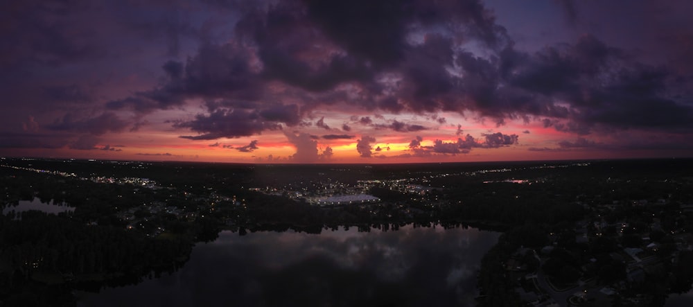 scarlet skies near water