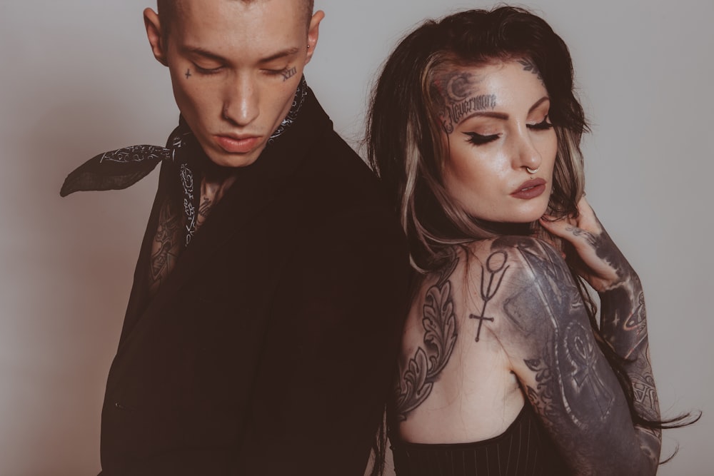 https://unsplash.com/photos/2_YRS26vM_Q man and woman with tattoos